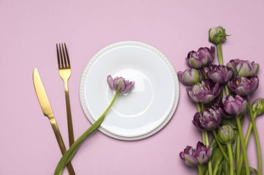 Concept of spring season table setting, top view