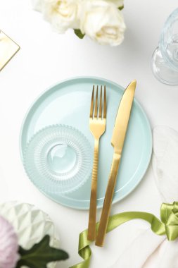 Concept of spring season table setting, top view