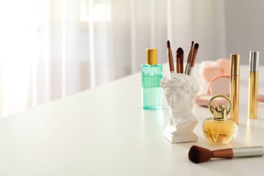 Concept of cosmetic and different female accessories, space for text