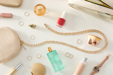 Concept of cosmetic and different female accessories, top view