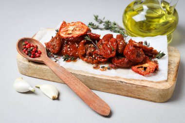 Concept of tasty food - sun-dried tomato