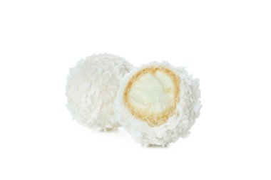 Tasty coconut candies isolated on white background