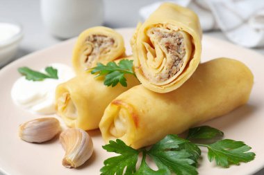 Concept of tasty food, thin pancakes with filling