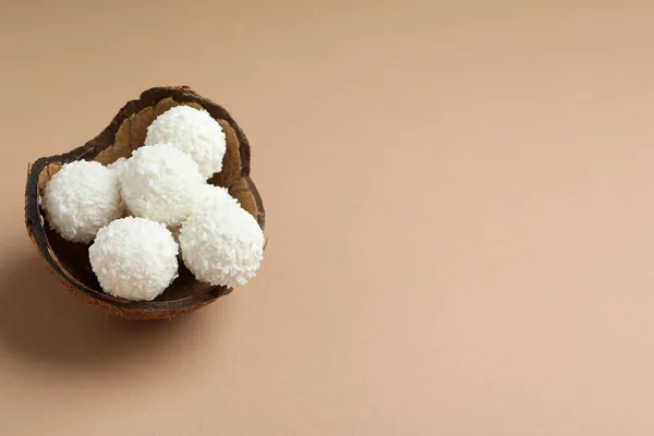Concept of tasty sweets, coconut candies, space for text