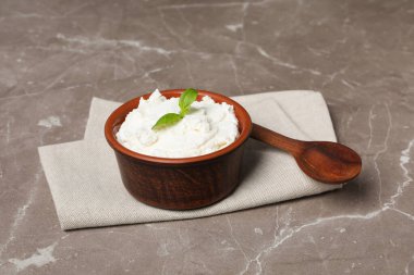 Concept of tasty dairy product - ricotta cheese