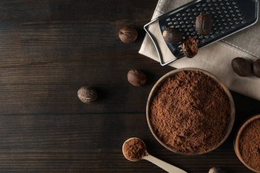 Concept of spices and condiments, nutmegs, space for text