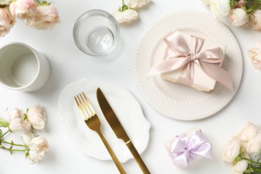 Concept of spring season table setting, top view