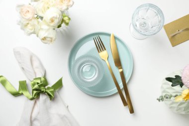 Concept of spring season table setting, top view