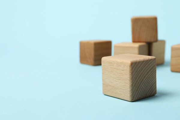 Blank wooden cubes for different concepts, space for text