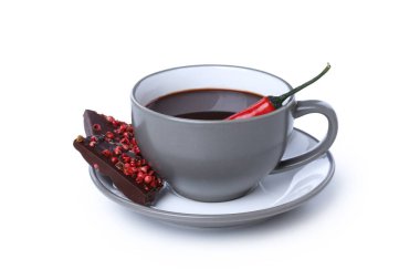 Concept of delicious food - chocolate with pepper and hot chocolate with pepper, isolated on white background