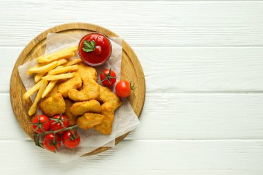 Concept of tasty fast food, nuggets, space for text