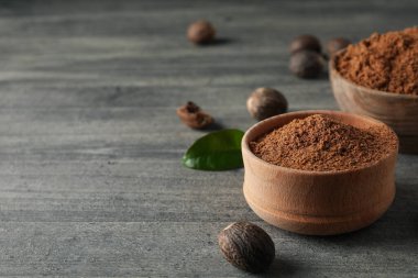 Concept of spices and condiments, nutmegs, space for text