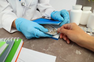 Concept of corruption in medicine, illegal money making in medicine