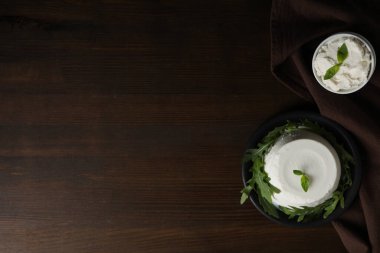 Concept of tasty dairy product - ricotta cheese, space for text