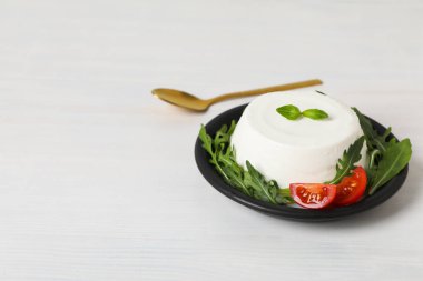 Concept of tasty dairy product - ricotta cheese, space for text