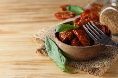 Concept of tasty food - delicious dried tomato