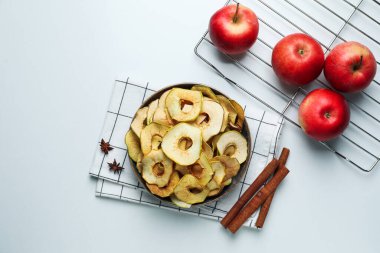 Concept of tasty food, dried apple chips, top view