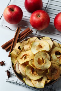 Concept of tasty food, dried apple chips