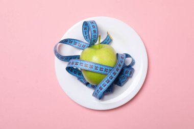 Diet and weight loss, healthy lifestyle, composition with measuring tape