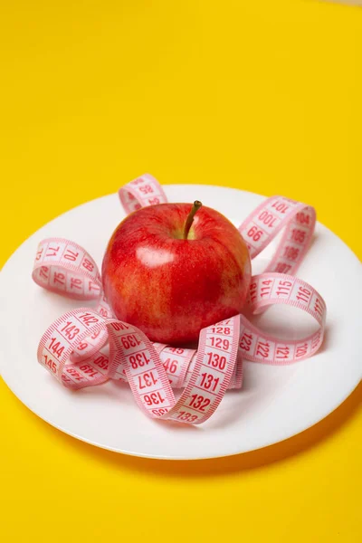 Diet and weight loss, healthy lifestyle, composition with measuring tape