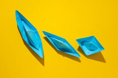 Concept of travel and adventure with paper boats
