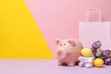 Concept of saving money for easter holidays, space for text