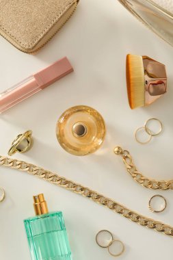 Concept of cosmetic and different female accessories, top view