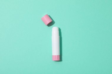 Concept of different office stationery with glue