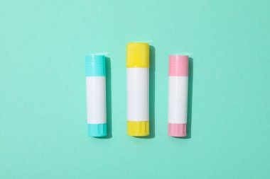 Concept of different office stationery with glue