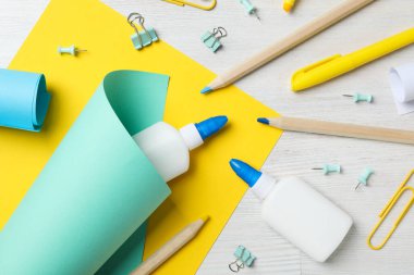 Concept of different office stationery with glue