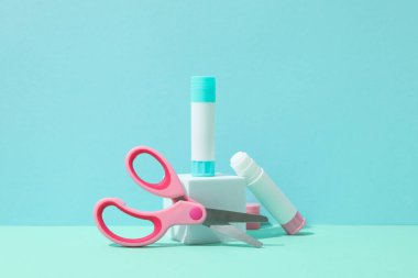 Concept of different office stationery with glue