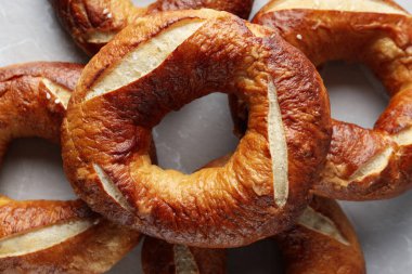 Concept of tasty food - bagel, tasty bakery products