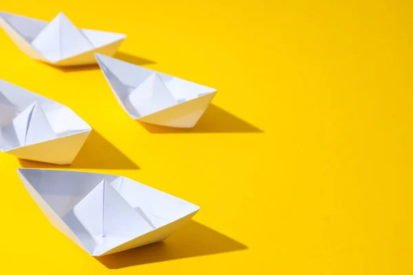 Concept of travel and adventure with paper boats