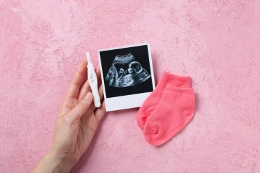 Concept of pregnancy and maternity, top view