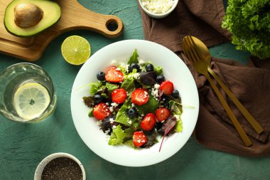 Concept of tasty salad, salad with strawberry, top view