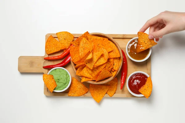 Concept of tasty snacks, corn chips, top view