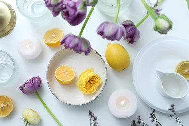 Concept of spring season table setting, top view