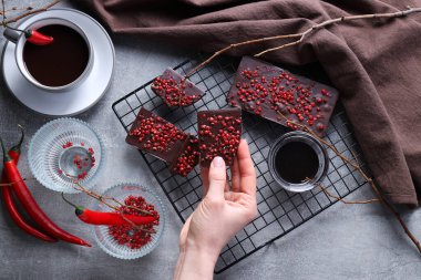 Concept of delicious food - chocolate with pepper and hot chocolate with pepper