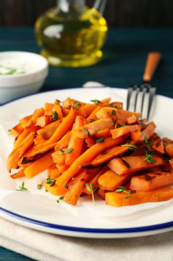 Concept of tasty food, fried sweet potato, close up