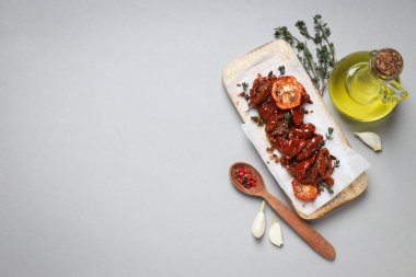 Concept of tasty food - sun-dried tomato, space for text