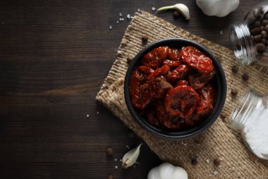 Concept of tasty food - sun-dried tomato, space for text