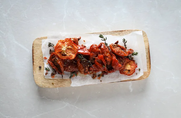 stock image Concept of tasty food - sun-dried tomato, top view