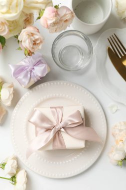 Concept of spring season table setting, top view