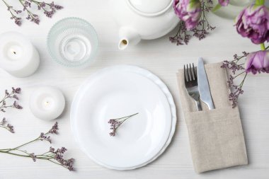 Concept of spring season table setting, top view