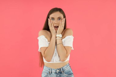 Concept of people, young woman on pink background