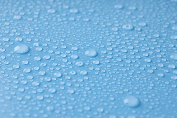 Blå Bakgrund Med Vatten Droppar Närbild — Stockfoto