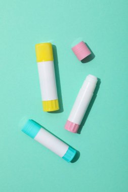 Concept of different office stationery with glue