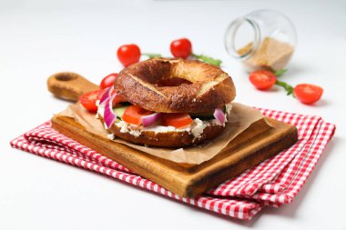 Concept of delicious food - tasty bagel sandwich