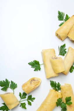 Concept of tasty food, thin pancakes with filling, space for text