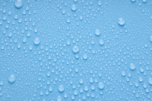 Blå Bakgrund Med Vatten Droppar Närbild — Stockfoto